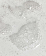 HYDROXY ACID - SEBU-LAC LOTION close up texture